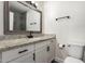 Modern bathroom with granite counters, white cabinets, and black hardware at 14601 N Kings Way, Fountain Hills, AZ 85268