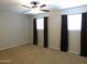 Bedroom with ceiling fan, natural light, and neutral colored carpet at 14636 N Yerba Buena Way # B, Fountain Hills, AZ 85268