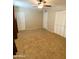 Bedroom with neutral carpet, ceiling fan, and closet at 14636 N Yerba Buena Way # B, Fountain Hills, AZ 85268