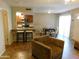 Open concept living area with kitchen, dining table, and cozy seating at 14636 N Yerba Buena Way # B, Fountain Hills, AZ 85268
