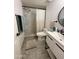 Bathroom with a modern vanity, updated fixtures, and a walk-in shower featuring a shower curtain at 1505 N Center St # 220, Mesa, AZ 85201