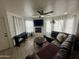 Inviting living room with a fireplace, comfortable seating, and ample natural light at 1505 N Center St # 220, Mesa, AZ 85201
