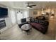 Spacious living room featuring modern decor, a stylish couch, and an open layout at 1505 N Center St # 220, Mesa, AZ 85201