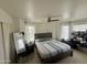 Bright main bedroom featuring neutral tones, a ceiling fan, and an abundance of natural light at 1505 N Center St # 220, Mesa, AZ 85201