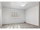Bedroom with carpet flooring, a window with shutters, and a ceiling fan providing a bright living space at 15243 N 52Nd Dr, Glendale, AZ 85306