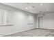 Bright bedroom featuring plantation shutters, neutral paint, modern recessed lighting, and a spacious closet at 15243 N 52Nd Dr, Glendale, AZ 85306