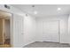 Neutral bedroom featuring carpet flooring, recessed lighting, and closet and entry doors in a bright, airy space at 15243 N 52Nd Dr, Glendale, AZ 85306