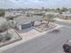 Charming single-story home featuring a well-manicured front yard and an attached two-car garage at 15243 N 52Nd Dr, Glendale, AZ 85306