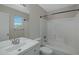 Bright bathroom with tub and shower combination, window, and modern fixtures at 15346 W Hearn Rd, Surprise, AZ 85379