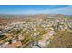 Expansive aerial view of a residential community with mountain views and desert landscaping at 1637 E Camino Del Santo --, Phoenix, AZ 85022