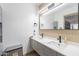 Bathroom with double sinks and large mirror at 1637 E Camino Del Santo --, Phoenix, AZ 85022