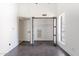 Bright bedroom with wood floors, closet, and window at 1637 E Camino Del Santo --, Phoenix, AZ 85022