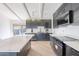 Spacious kitchen features white marble island, modern cabinets, and stainless steel appliances at 1637 E Camino Del Santo --, Phoenix, AZ 85022