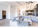 Open-concept living room boasting modern design, seamless flow to the kitchen, and neutral decor at 1637 E Camino Del Santo --, Phoenix, AZ 85022