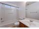Bathroom with a shower-tub combo and a single sink vanity at 168 S 223Rd Dr, Buckeye, AZ 85326