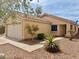 Charming single-story home features a tile roof, neutral stucco exterior, and a well-maintained front yard with desert landscaping at 168 S 223Rd Dr, Buckeye, AZ 85326
