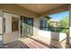 Picturesque balcony offering outdoor living with an overhead fan and a tranquil neighborhood view at 20121 N 76Th St # 2064, Scottsdale, AZ 85255