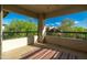 Relaxing balcony with a view of lush greenery, providing a serene outdoor living space at 20121 N 76Th St # 2064, Scottsdale, AZ 85255