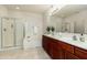 Bathroom features a large vanity with dual sinks and a separate shower at 20121 N 76Th St # 2064, Scottsdale, AZ 85255