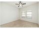 Clean and bright bedroom with neutral carpet and natural light at 20121 N 76Th St # 2064, Scottsdale, AZ 85255