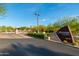 Welcoming entrance to the community of Vintage at Grayhawk with desert landscaping and a gate at 20121 N 76Th St # 2064, Scottsdale, AZ 85255