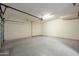 Spacious garage offering ample parking and storage with an automatic door and lighting at 20121 N 76Th St # 2064, Scottsdale, AZ 85255