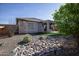 Well maintained backyard featuring turf and drought tolerant landscaping, perfect for enjoying the outdoors at 20222 N 267Th Ln, Buckeye, AZ 85396