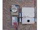 Exterior electrical panel and solar meter with visible warnings and system components at 20222 N 267Th Ln, Buckeye, AZ 85396