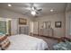 Comfortable main bedroom with a gray color scheme and doorways to other rooms at 20222 N 267Th Ln, Buckeye, AZ 85396