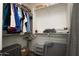Organized walk-in closet with ample storage and shelving perfect for clothes and accessories at 20222 N 267Th Ln, Buckeye, AZ 85396