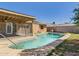 Backyard pool featuring cool blue water, a lounging area, and a covered patio area at 2049 W Joan De Arc Ave, Phoenix, AZ 85029