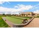 Well-maintained bocce ball court with lush surroundings, perfect for friendly competition and outdoor fun at 2101 S Meridian Rd # 26, Apache Junction, AZ 85120