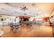 Expansive meeting room featuring a hardwood floor, ceiling fans, and flexible seating, ideal for gatherings at 2101 S Meridian Rd # 26, Apache Junction, AZ 85120