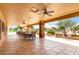 Spacious covered patio with comfortable seating, ceiling fans, and decorative columns, perfect for enjoying outdoor living at 2101 S Meridian Rd # 26, Apache Junction, AZ 85120