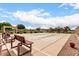 Well-maintained shuffleboard courts with seating areas and landscaped surroundings, a great community activity at 2101 S Meridian Rd # 26, Apache Junction, AZ 85120