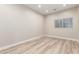 Empty neutral bedroom featuring carpet floors, and a small window at 21313 N 59Th Dr, Glendale, AZ 85308