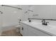 Bright bathroom featuring a double sink vanity with modern fixtures and a shower/tub combo at 21846 E Bonanza Ct, Queen Creek, AZ 85142