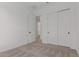 This bedroom has neutral carpet, closet with sliding doors, and lots of space at 21846 E Bonanza Ct, Queen Creek, AZ 85142