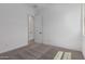 This bedroom has neutral carpet and an ensuite bathroom access for added convenience at 21846 E Bonanza Ct, Queen Creek, AZ 85142