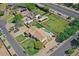 Gorgeous home on a large lot with a swimming pool, RV parking, and lush greenery at 23455 S 199Th Pl, Queen Creek, AZ 85142