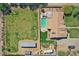 Large lot featuring home, pool, outbuilding, RV parking, and yard at 23455 S 199Th Pl, Queen Creek, AZ 85142