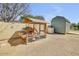 Backyard includes a chicken coop and an out-building offering ample space for your hobbies and needs at 23455 S 199Th Pl, Queen Creek, AZ 85142