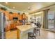 Bright kitchen featuring granite countertops and plenty of cabinet space at 23455 S 199Th Pl, Queen Creek, AZ 85142