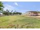 A spacious green pasture, ideal for livestock grazing, featuring perimeter fencing and ample room at 23455 S 199Th Pl, Queen Creek, AZ 85142