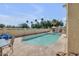 A private backyard pool offers a tranquil oasis with ample lounge space and desert landscaping at 23455 S 199Th Pl, Queen Creek, AZ 85142