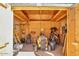 View of the interior of a storage shed filled with tools, a lawnmower, and equipment at 23455 S 199Th Pl, Queen Creek, AZ 85142