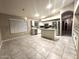 Bright, open kitchen featuring stainless steel appliances and a large island perfect for entertaining at 2409 N 112Th Ln, Avondale, AZ 85392