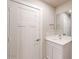 Bathroom featuring a vanity with storage, a framed mirror, and modern fixtures at 2509 W Seaver Ave, Apache Junction, AZ 85120