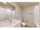 Bathroom featuring a vanity, a toilet, and a shower tub combination at 2509 W Seaver Ave, Apache Junction, AZ 85120