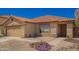 Charming single-story home with a well-maintained yard, two-car garage, and desert landscaping at 252 S Canfield --, Mesa, AZ 85208